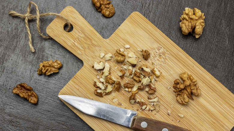 chopped walnuts on cutting board