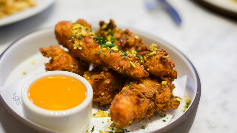 Chicken-fried carrots with hot honey aïoli