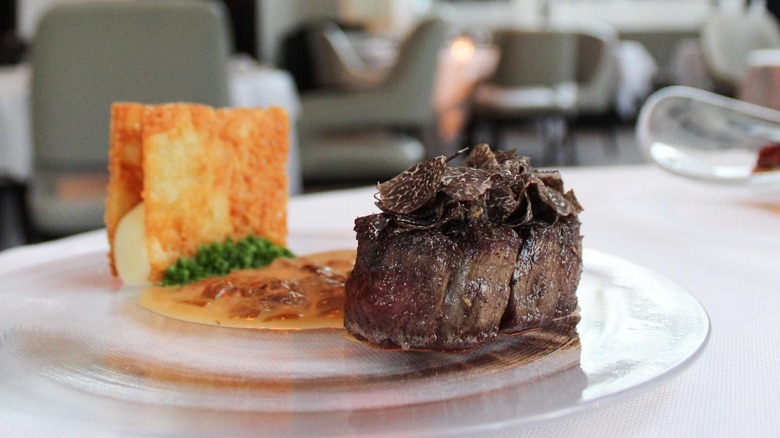 steak on plate at Jean-Georges