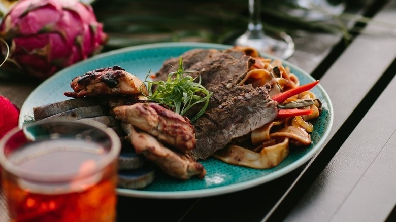 Steak dish and cocktails