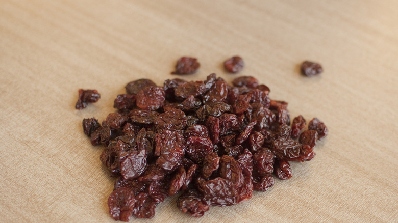 Dried sour cherries on wood