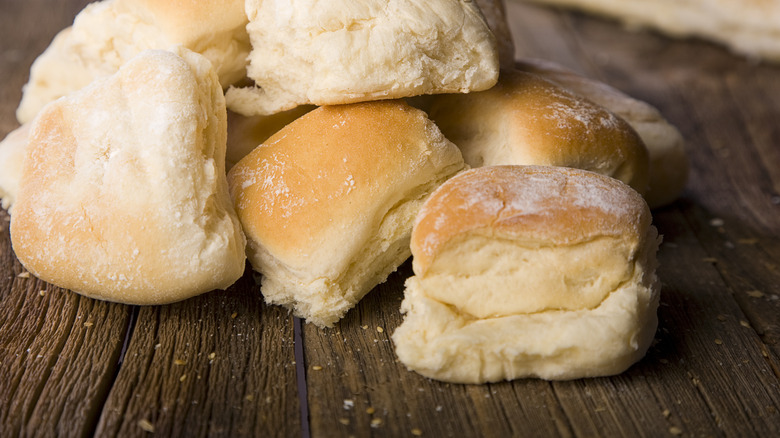 Dinner rolls on wood