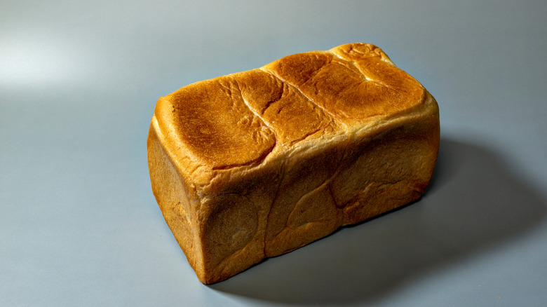 Pullman bread on gray background