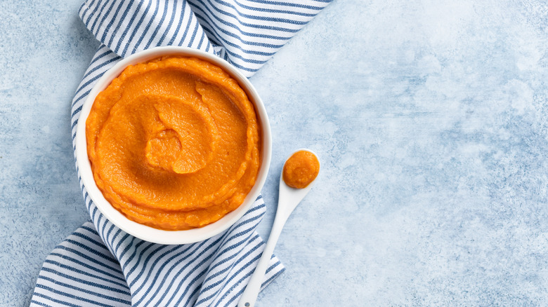 Pumpkin puree in white bowl