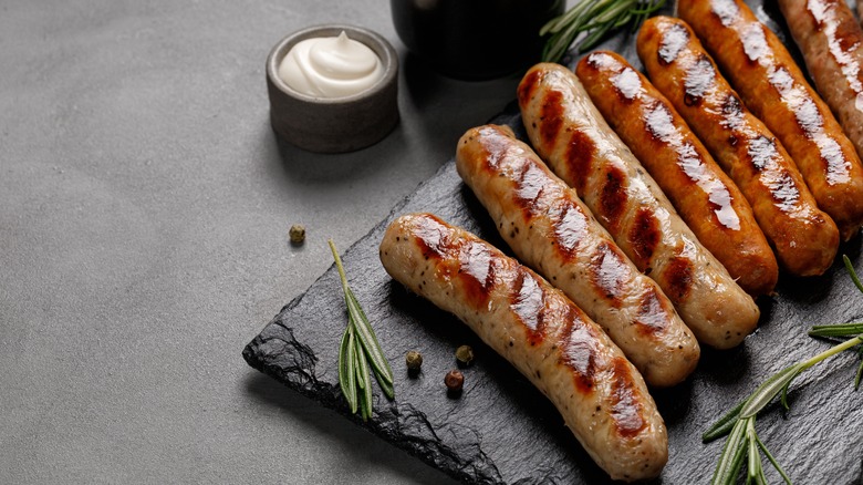 Sausages on cutting board