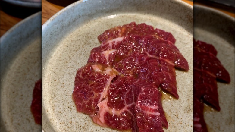 Raw marinated steak