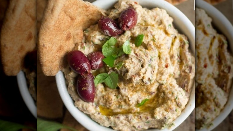 Homemade hummus and olives