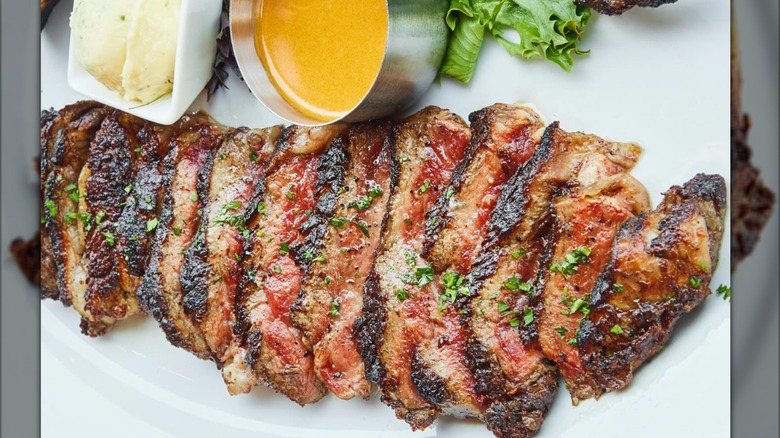 Al Biernat's steak on a white plate