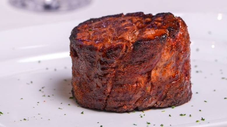 Steak 48 filet on white plate