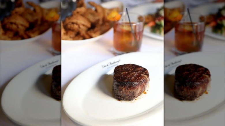 Vic and Anthony's steak on white plate
