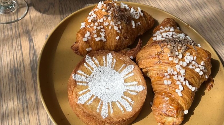 three croissants on platter