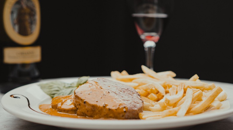 steak au poivre with french fries