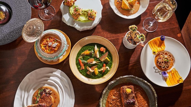 Table full of Indian dishes