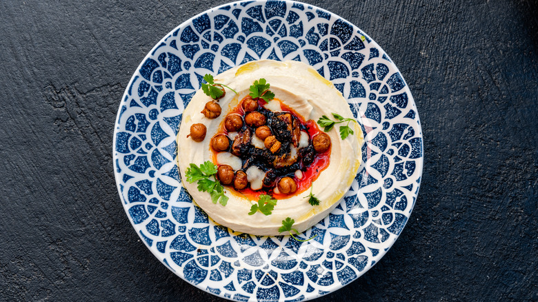 Smoky garlic hummus on plate