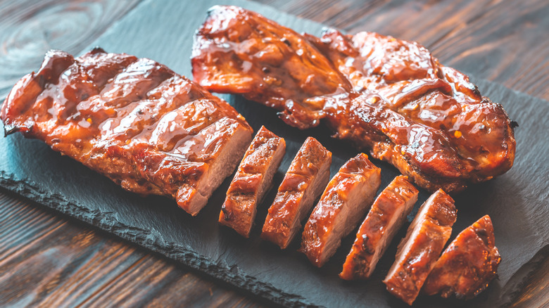 Barbecued pork on serving board