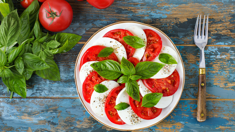 Caprese salad with fork