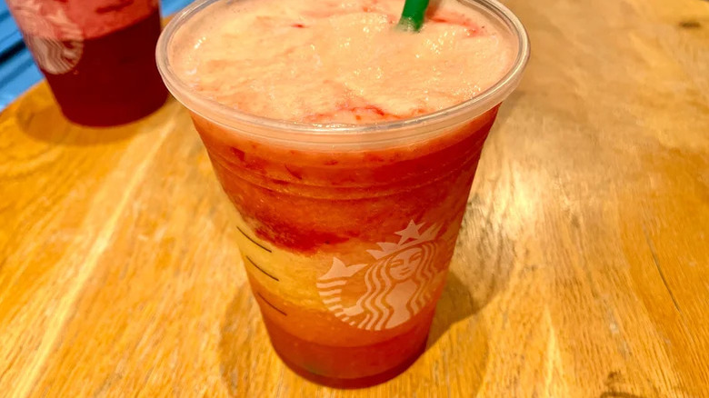 close up of frozen pineapple passionfruit lemonade refresher from starbucks