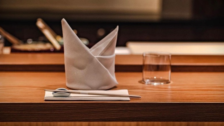 folded napkin on bar