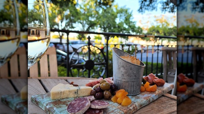 Wine and charcuterie board outdoors