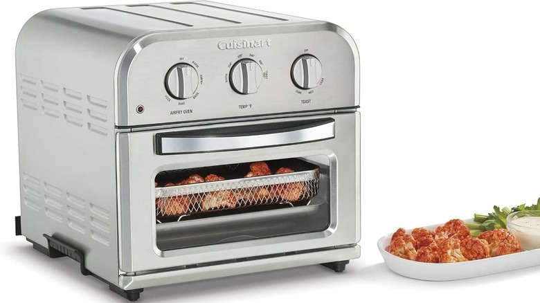 Cuisinart compact air fryer toaster oven with food inside