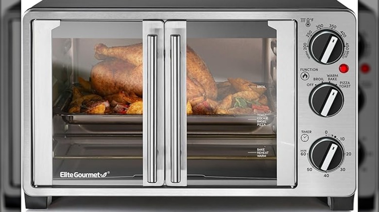 Elite Gourmet double French door countertop toaster oven with food inside