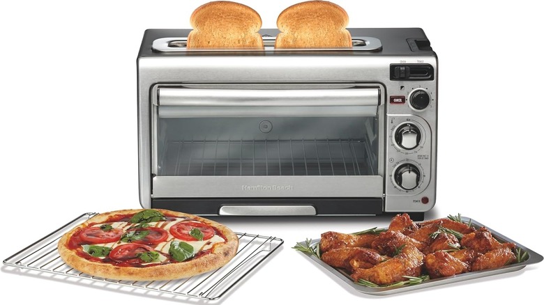 Hamilton Beach 2-in-1 countertop toaster oven with bread slices, rack of pizza, and pan of chicken