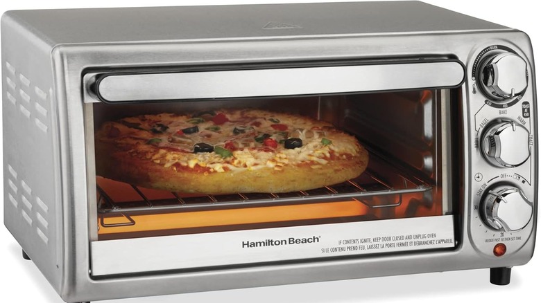 Hamilton Beach 4-slice toaster oven with pizza inside