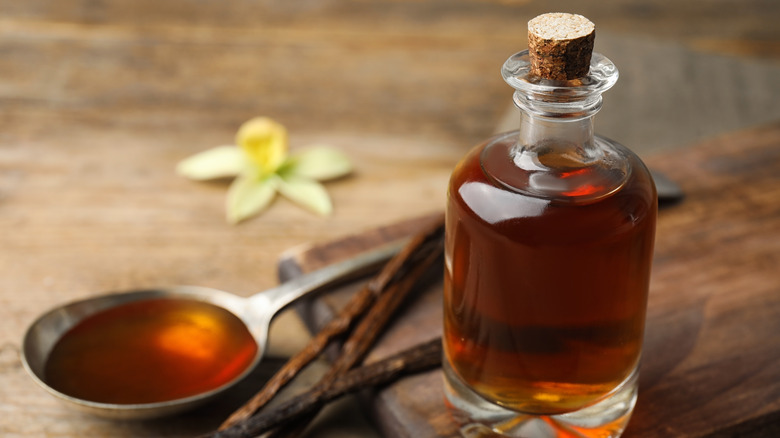 Vanilla extract in jar and spoon