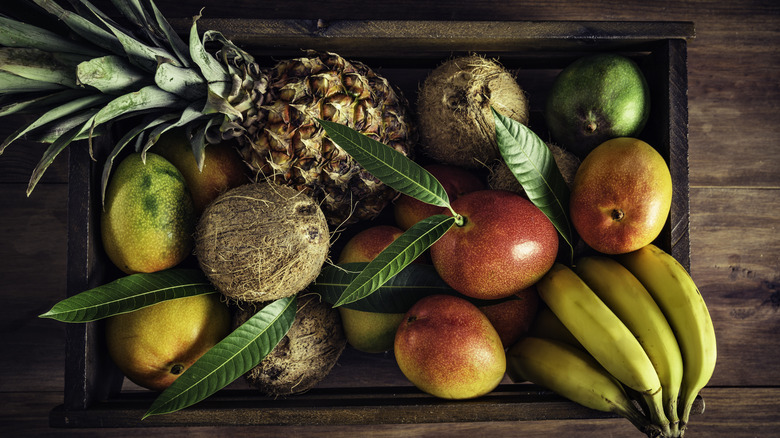 Box of pineapple, mango, banana, and coconut