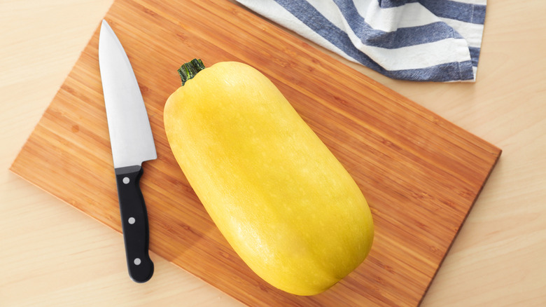 spaghetti squash on a wooden board