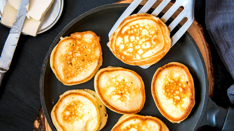 Small pancakes on pan 