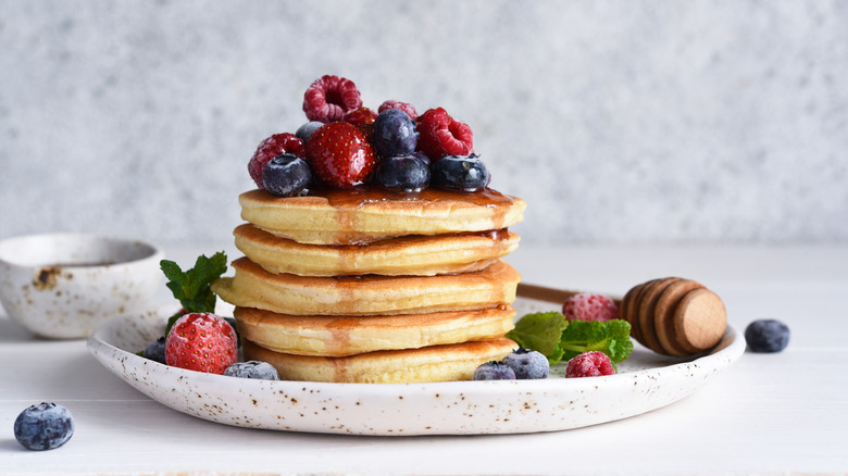 Pancakes with berries and syrup 