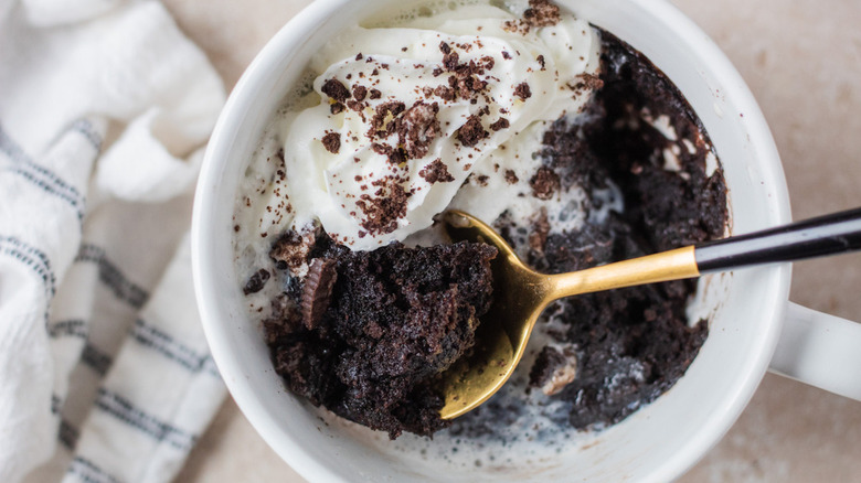 Spoon in Oreo mug cake 