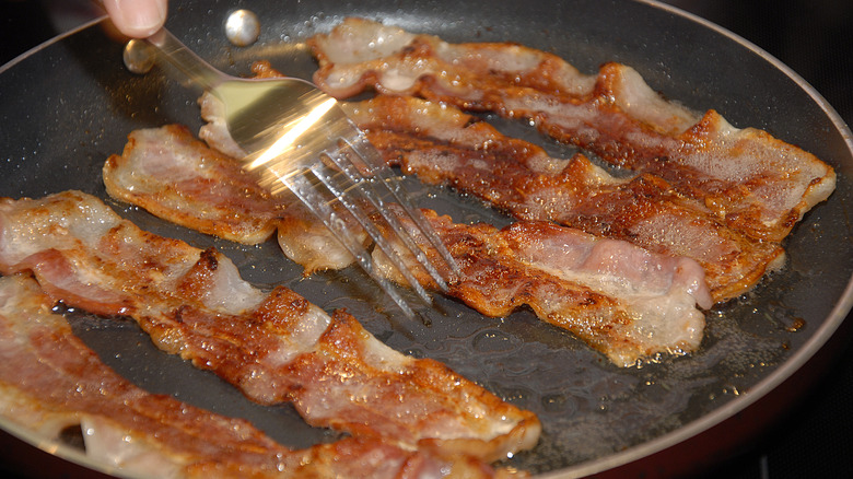 Bacon cooking in pan