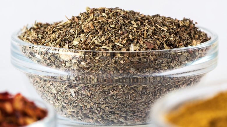 Close-up of a glass bowl of Italian seasoning