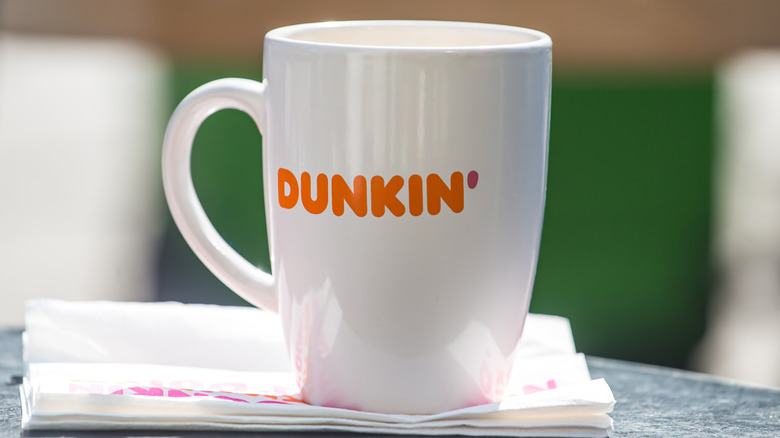 Dunkin' coffee cup on napkin