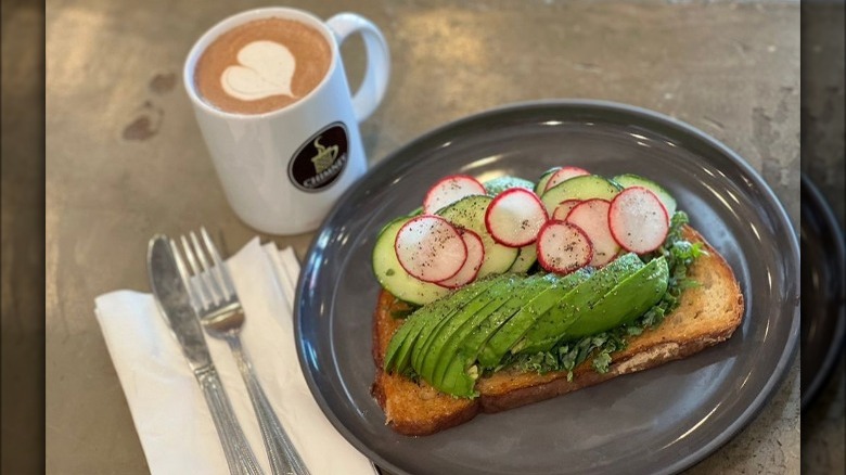 Avocado toast and coffee on table