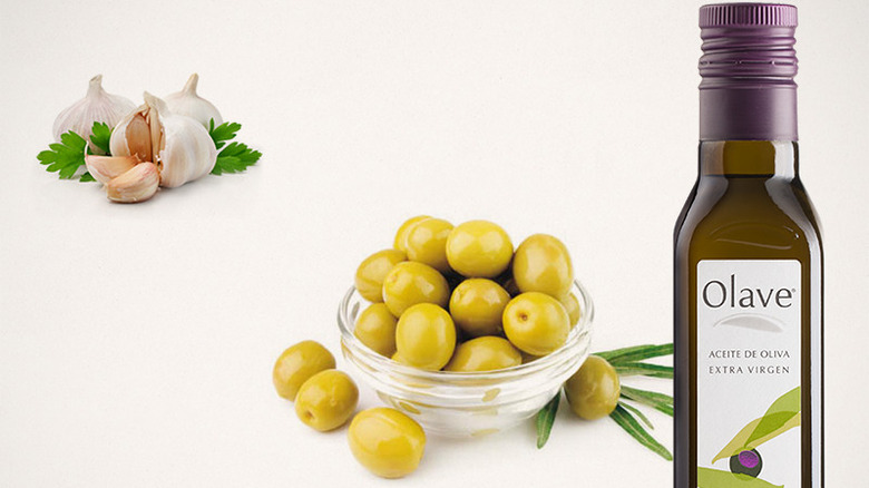 olave bottle with garlic and olives