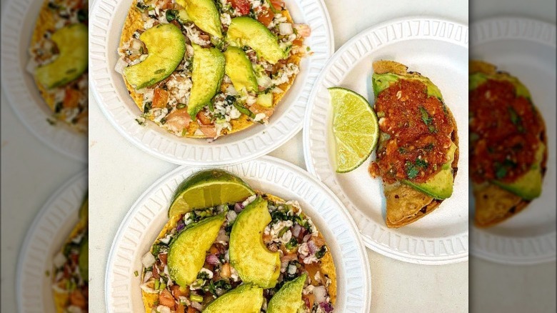 Three plates of tacos tostadas