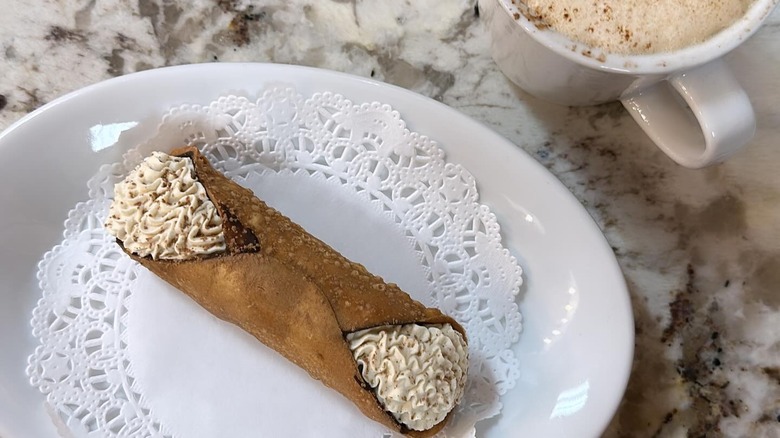 Cannoli cream, white plate, coffee