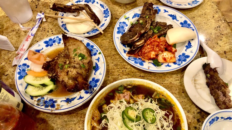 Various Vietnamese foods on table