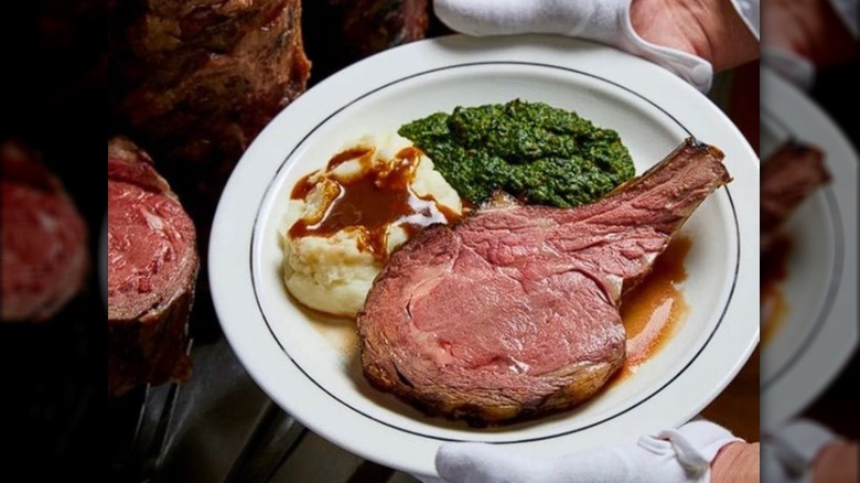 Plated prime rib and sides