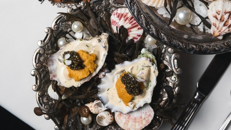 Poached oysters with caviar