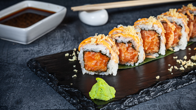 Spicy tuna roll with wasabi and soy sauce