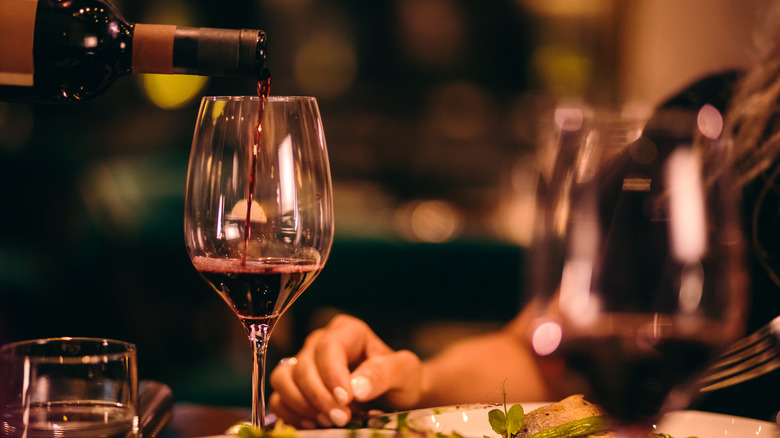 Wine pouring into glass