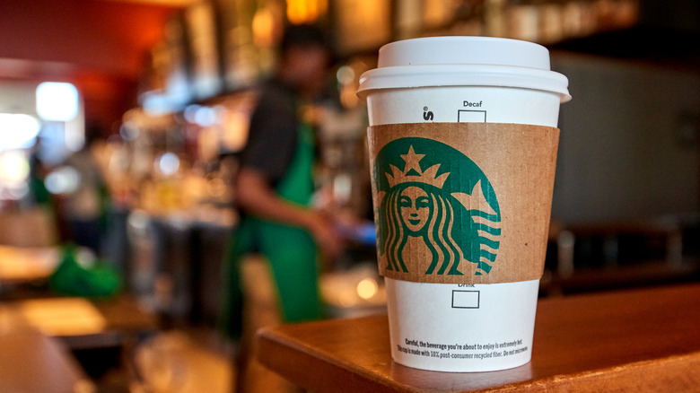 Starbucks cup on counter