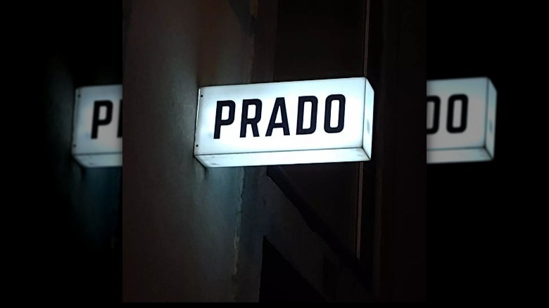 Prado outdoor signage at night