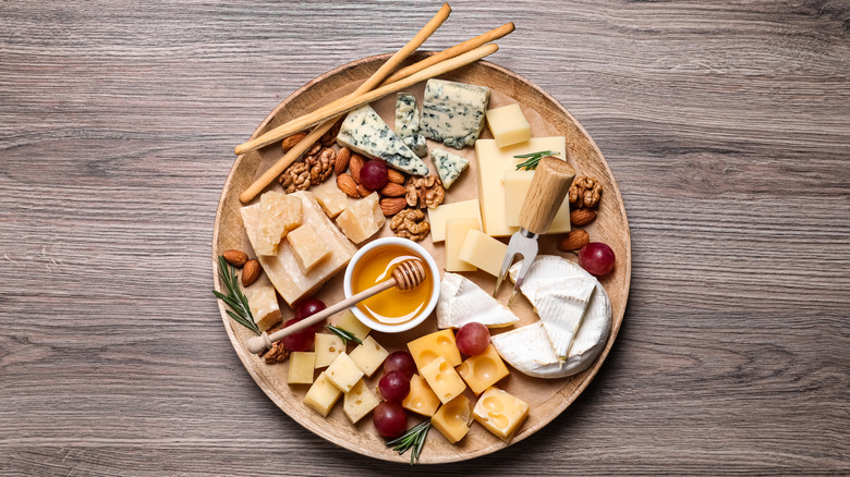Cheese selection on wooden board