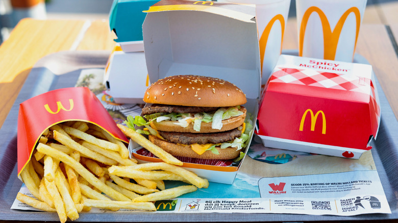 McDonald's tray with fries, McDouble, spicy McChicken, and drinks