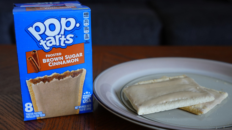 Brown sugar cinnamon Pop-Tarts box next to plated Pop-Tarts